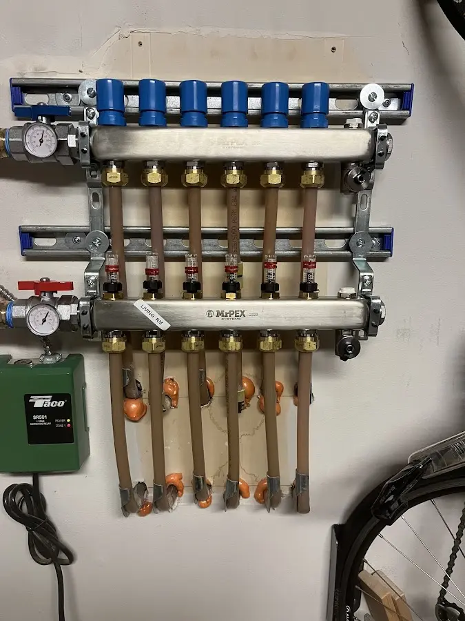 Plumber performing Water Heater Repair at a residential property in Haleiwa